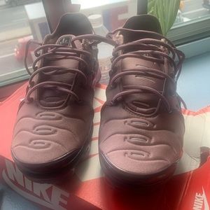Women’s size 8.5 burgundy Air Vapormax Plus.